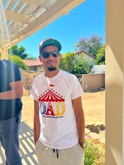 T-Shirt with "Dad of the birthday boy Tent" Graphic Design