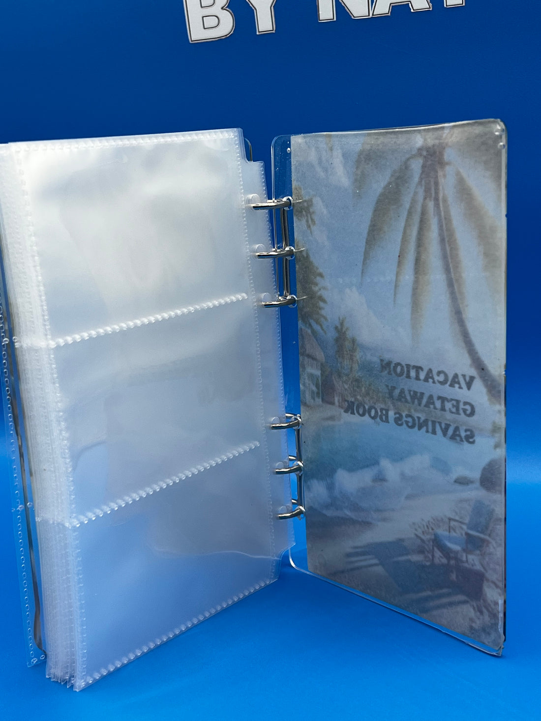 Vacation Savings Notebook with plastic pocket inserts