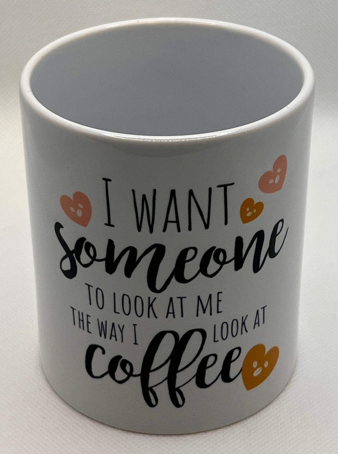 Mug with "I want someone to look at me the way I look at coffee" Graphic