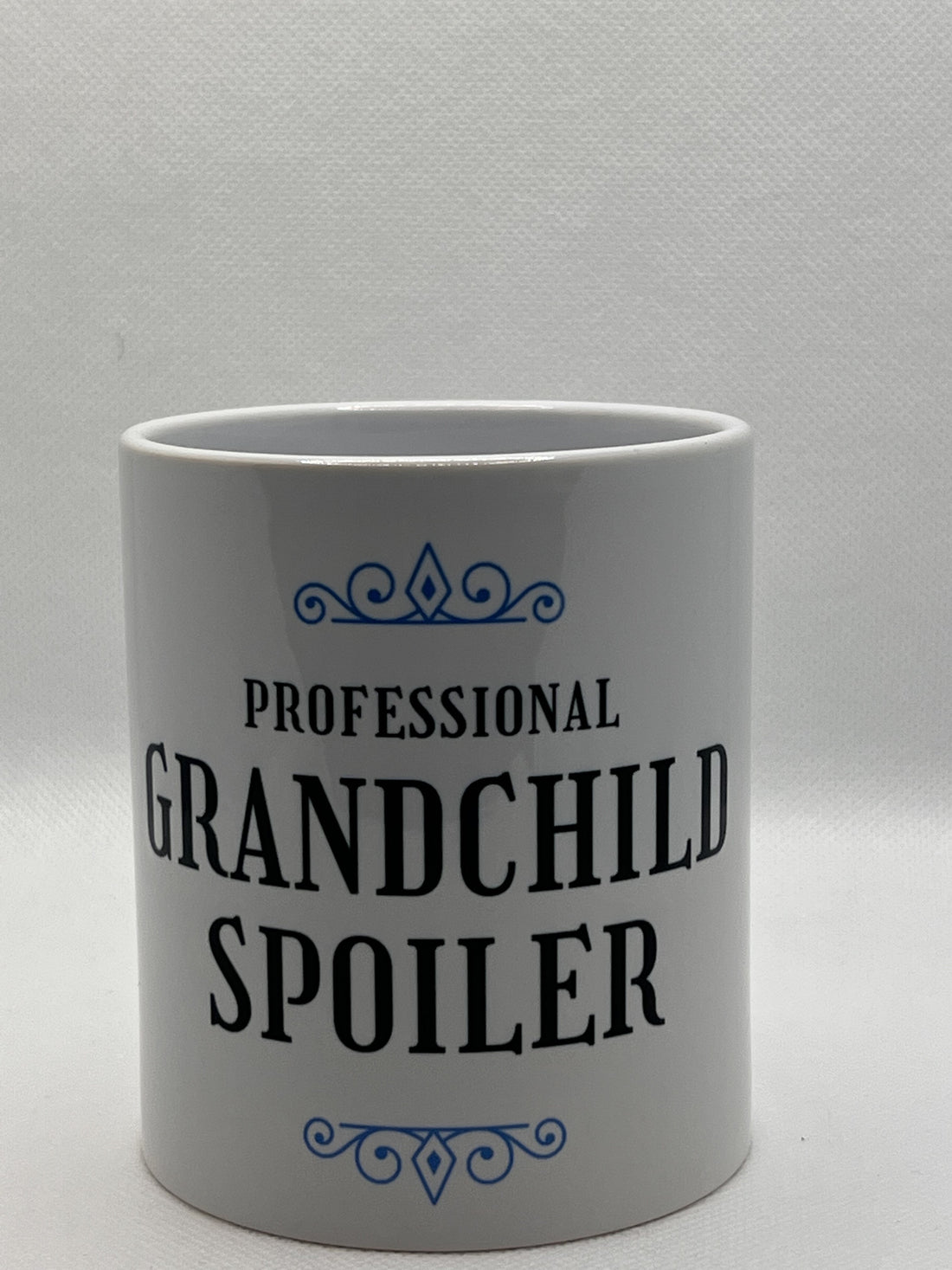 Mug with "Professional Grandchild Spoiler" Graphic